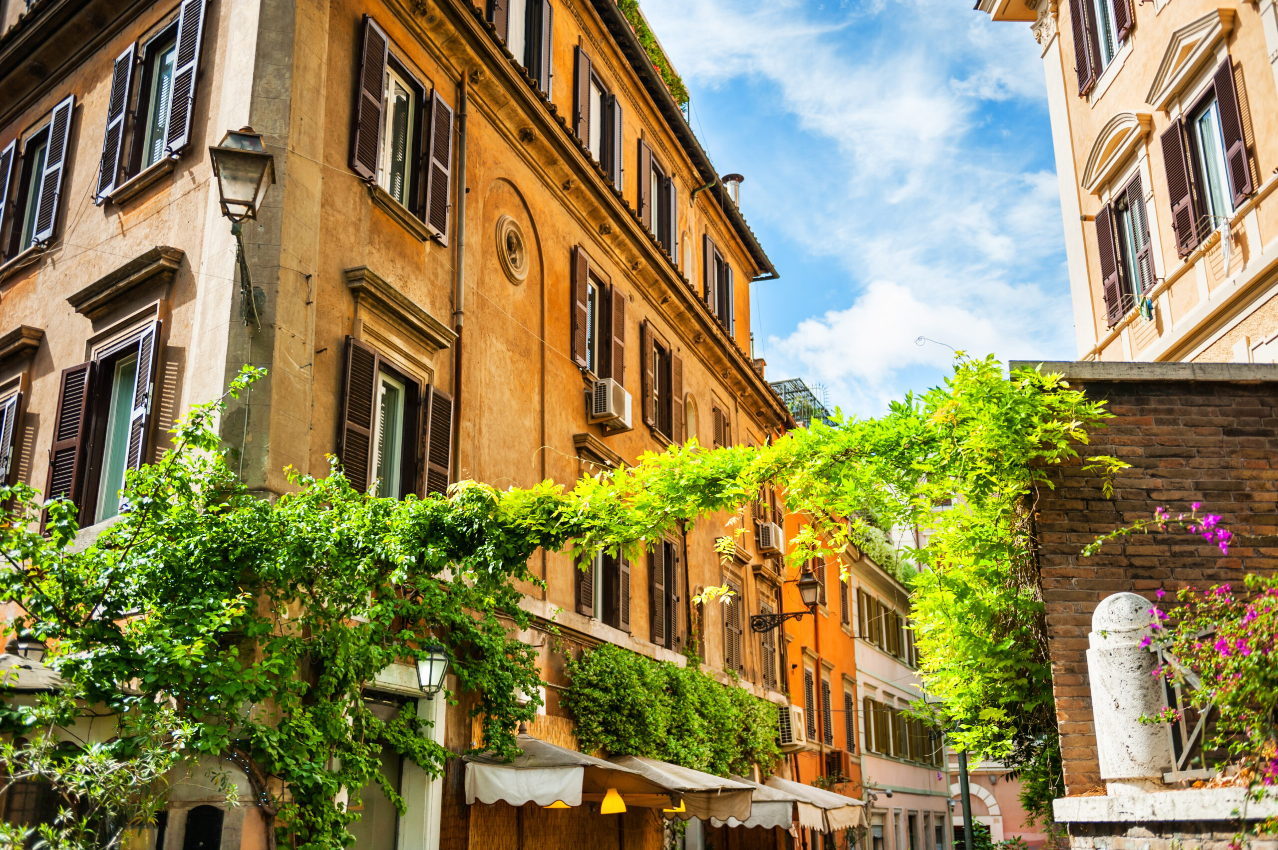 street in trastevere district, rome, italy