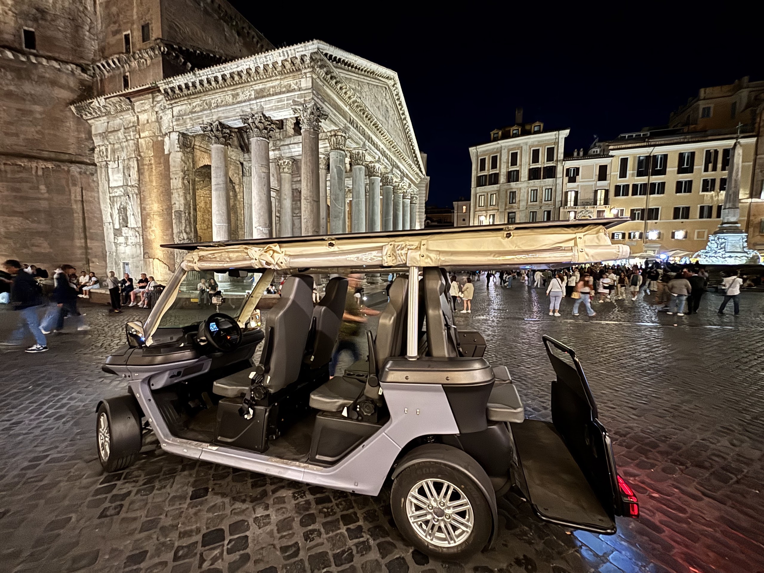 A golf cart at the Theatre of Marcellus in the evening