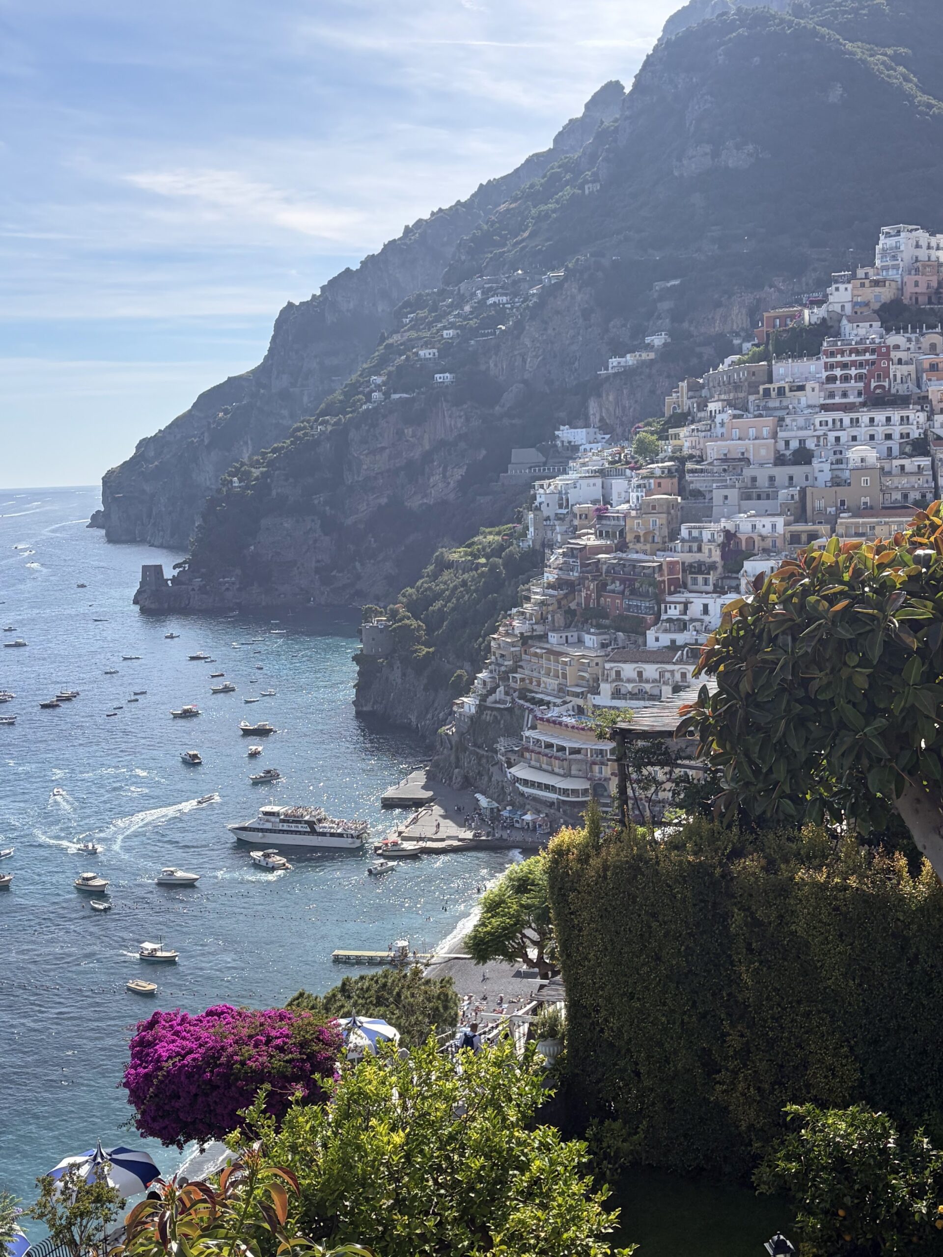 Positano's colourful hillside above the beach and boats