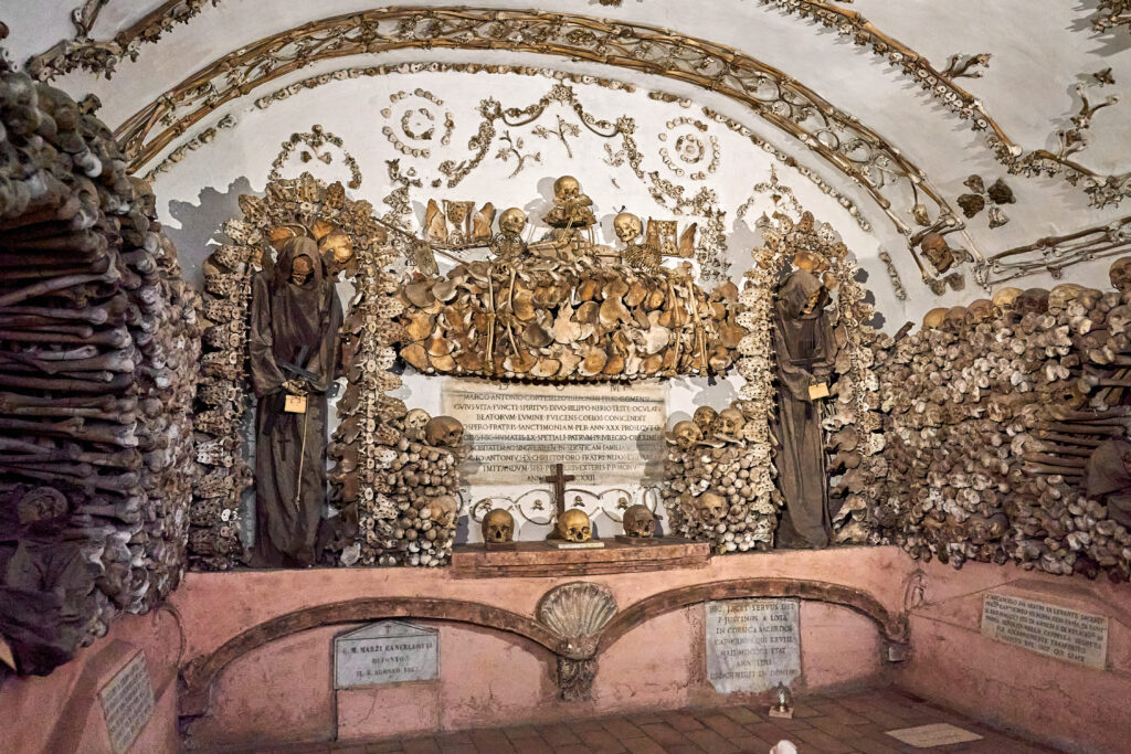 The bone decorated chapels of the Capuchin Crypt visited on a Rome golf cart tour