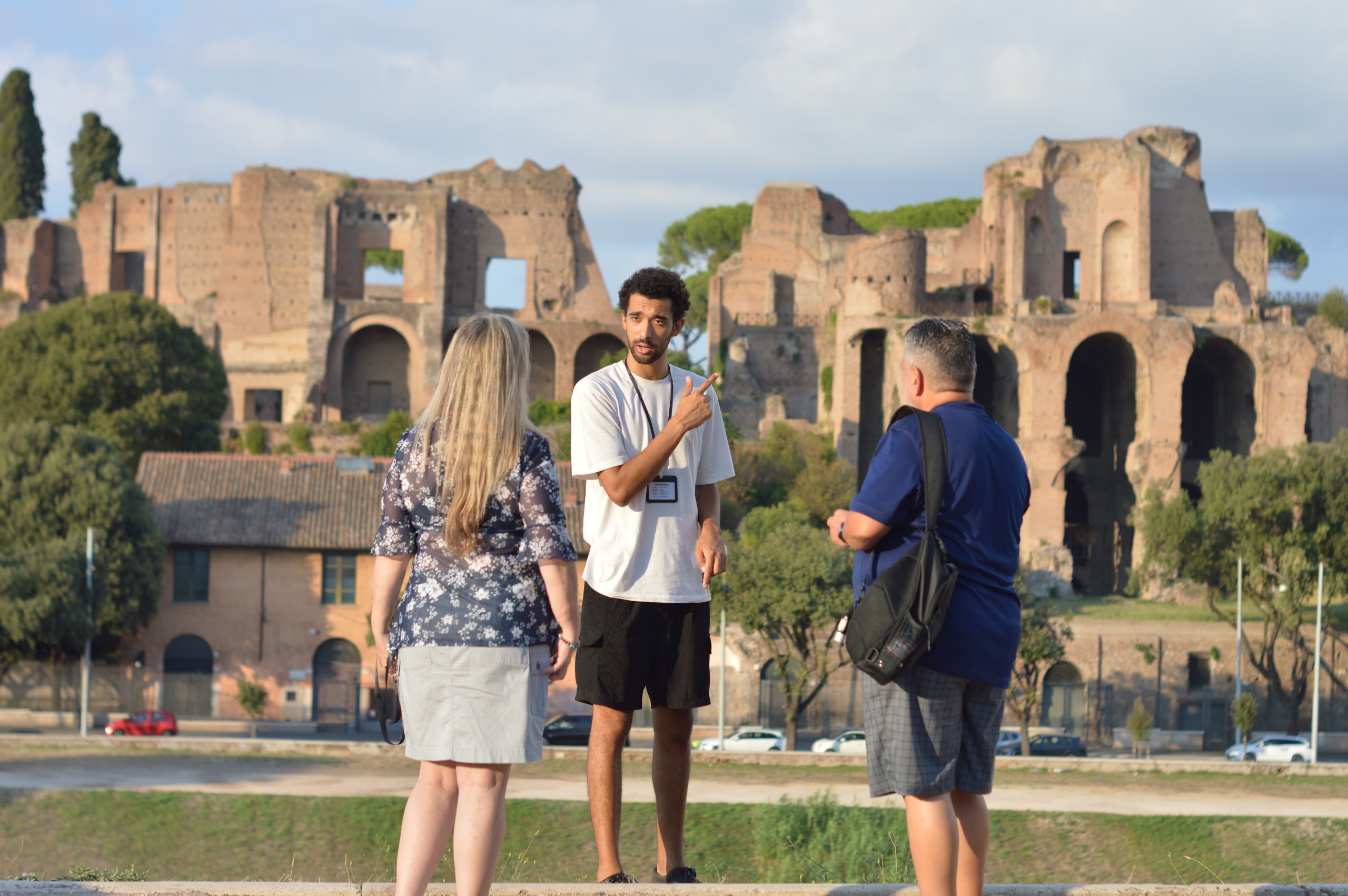 A guide with guests below the Palatine