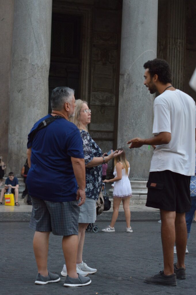 A guide talking with guests at the Pantheon
